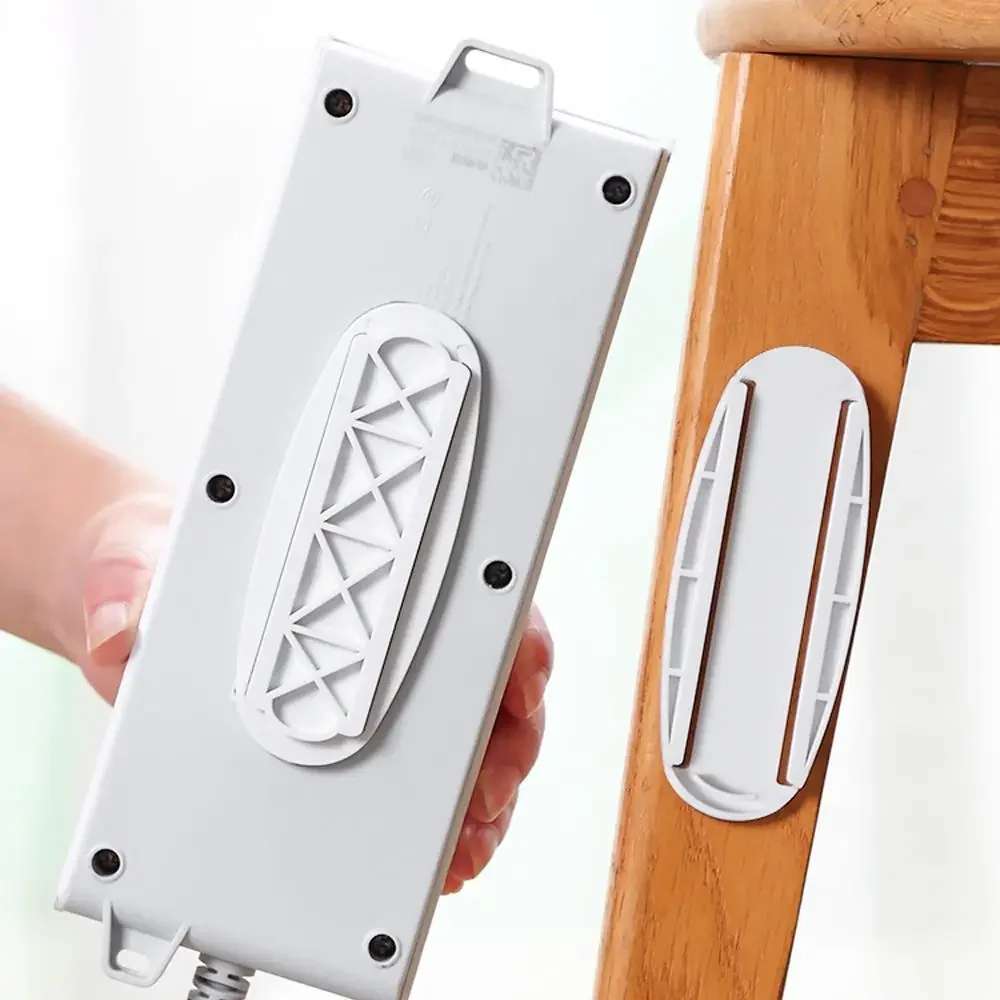 White Wall-Mounted Sticker Punch-free Plug Fixer Home Self-Adhesive Socket Fixer Seamless Power Strip Holder Home Decoration wall mounted socket fixer