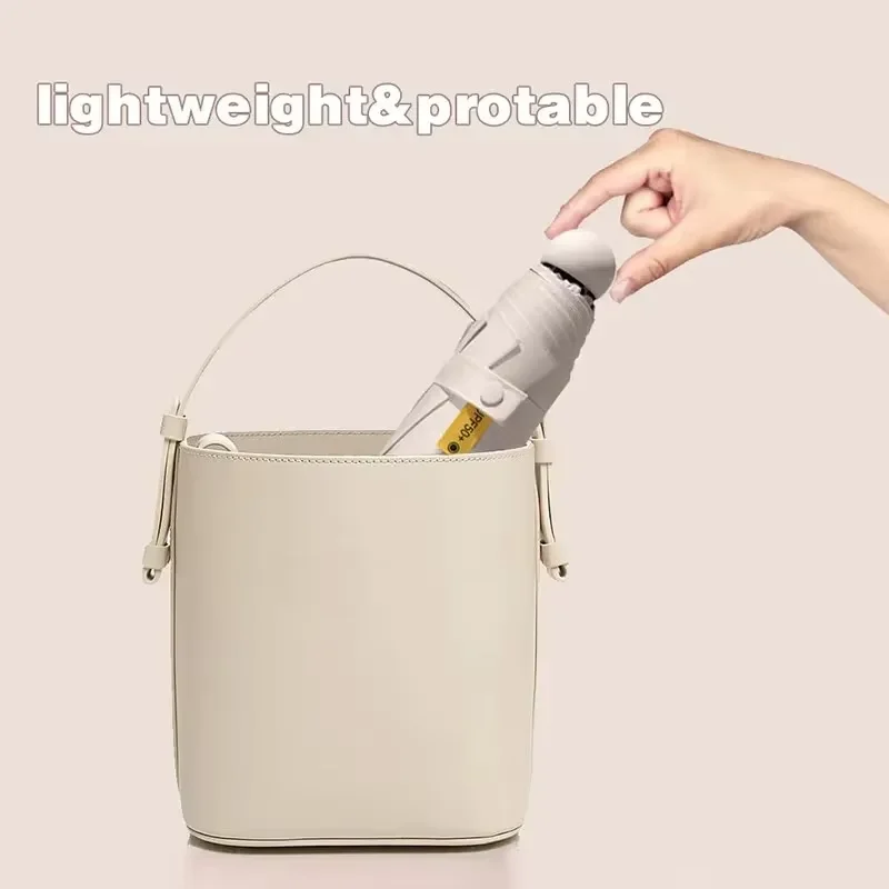 Foldable capsule umbrella portable mini sunshade sun protection umbrella rubber alloy handle five folding retractable umbrella
