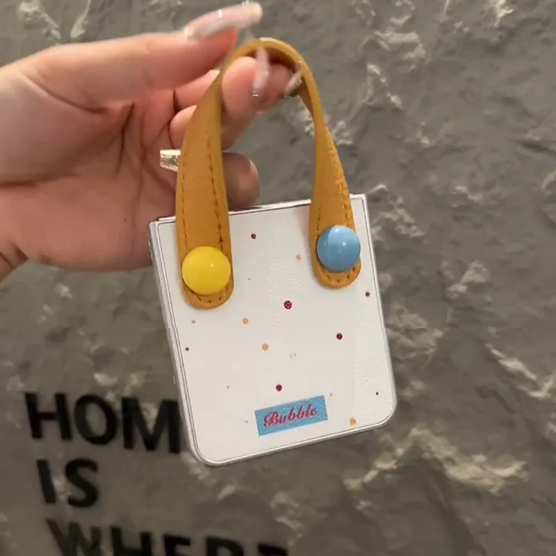 Charming Leather Wave Point Phone Case with Colorful Ball Wrist Strap