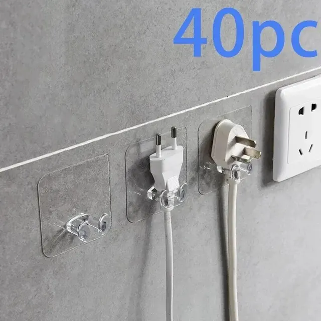 강력한 접착력과 투명한 방수 소재로 어떤 벽면에도 매끄럽게 조화를 이루는 다목적 PVC 벽 후크 전원 플러그 브래킷
