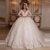 Vintage 2024 Lace Wedding Dresses Princess Ball Gown Beading Bridal Gowns Shinny Tulle Long Sleeves Ivory Dubai Marriage Dress