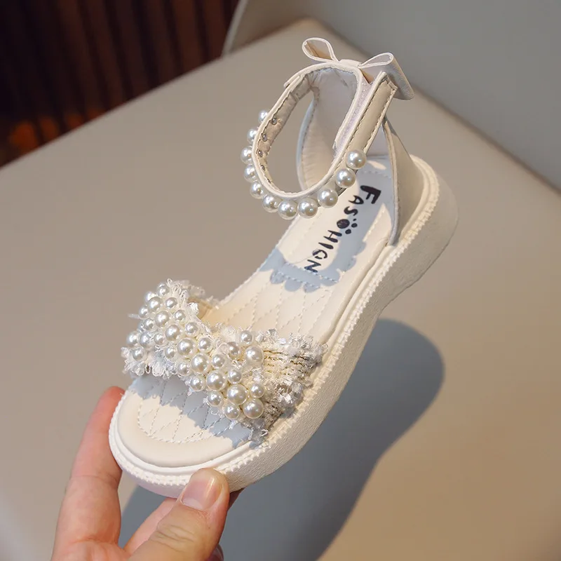 Sandały dziecięce dla dziewczynek 2023 modne buty z koralikami dla dzieci kokardka dla dzieci buty na plażę płaskie dziewczynki letnie klapki buty księżniczki