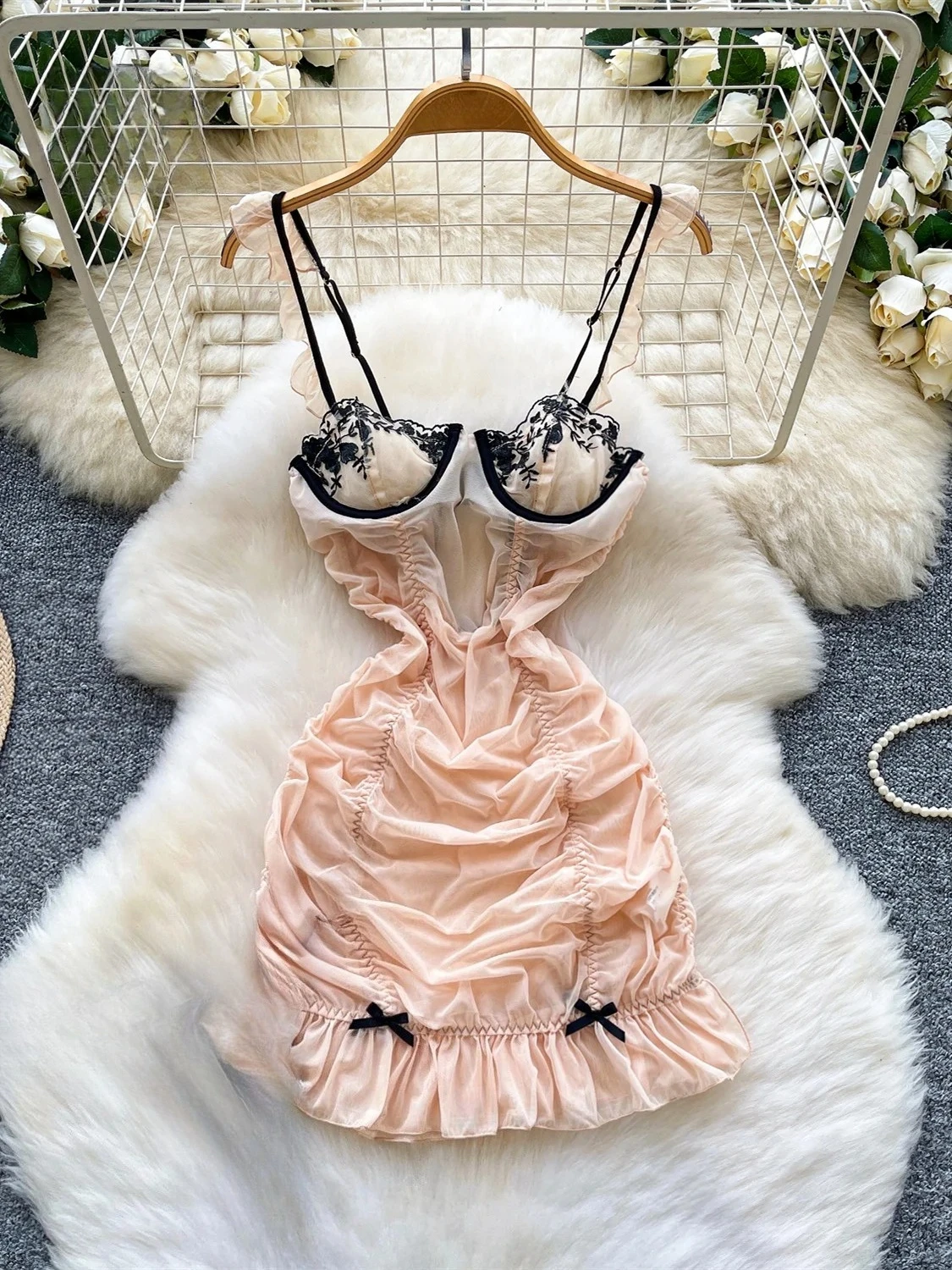 Embroidered Ruffle Dress shown from another angle with above-knee length and flattering shape