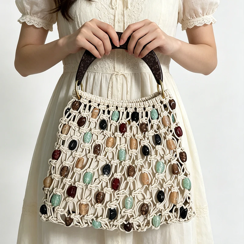 Borsa a mano da donna retrò intrecciata a mano con perline, di lusso, elegante, alla moda europea e americana, borsa da spiaggia da donna