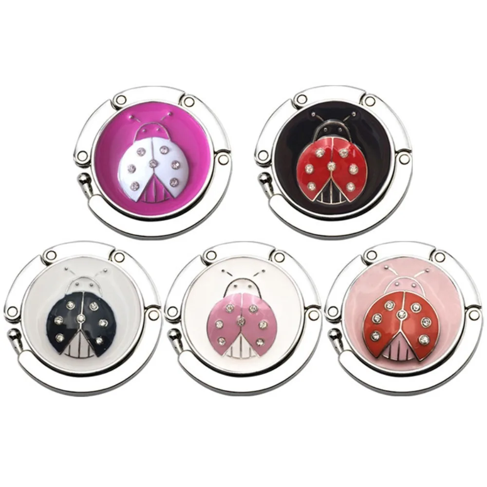 1Pcs Round Metal Hanger Hook Holder Unique Folding Portable Butterfly Pattern Fashion Table Hook Crystal Alloy Purse Handbag Bag bag hanger self adhesive wall hooks magnet hooks adhesive hooks suction cup hook kitchen hooks wall mount hooks self adhesive hooks adhesive wall hooks coat hook aluminum alloy buckle hook