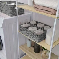 Rectangular rattan storage baskets, shallow wicker decorative baskets sold in bulk, and hand-woven nesting bread baskets. 2