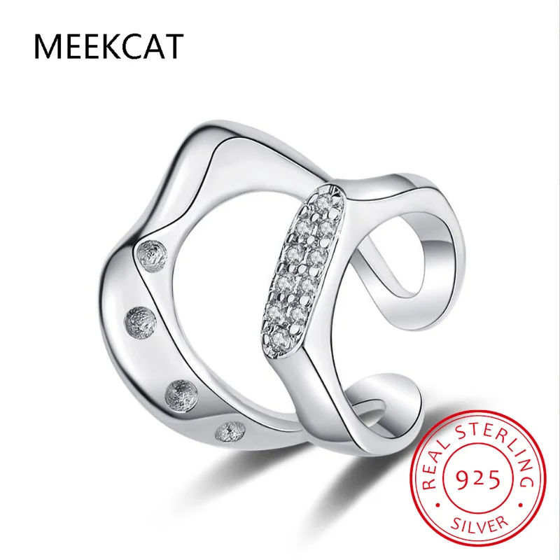 

Женские серьги-каффы с серебряным сиянием и цирконом