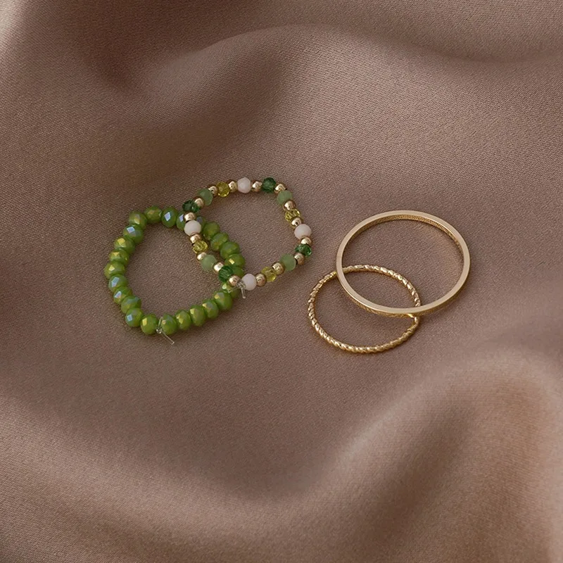 2025 Buntes Ringset im Modestil, süßer und einfacher elastischer Perlenring, koreanische geometrische Damenbekleidung, kreative Accessoires, Abendkleid_voghion.com