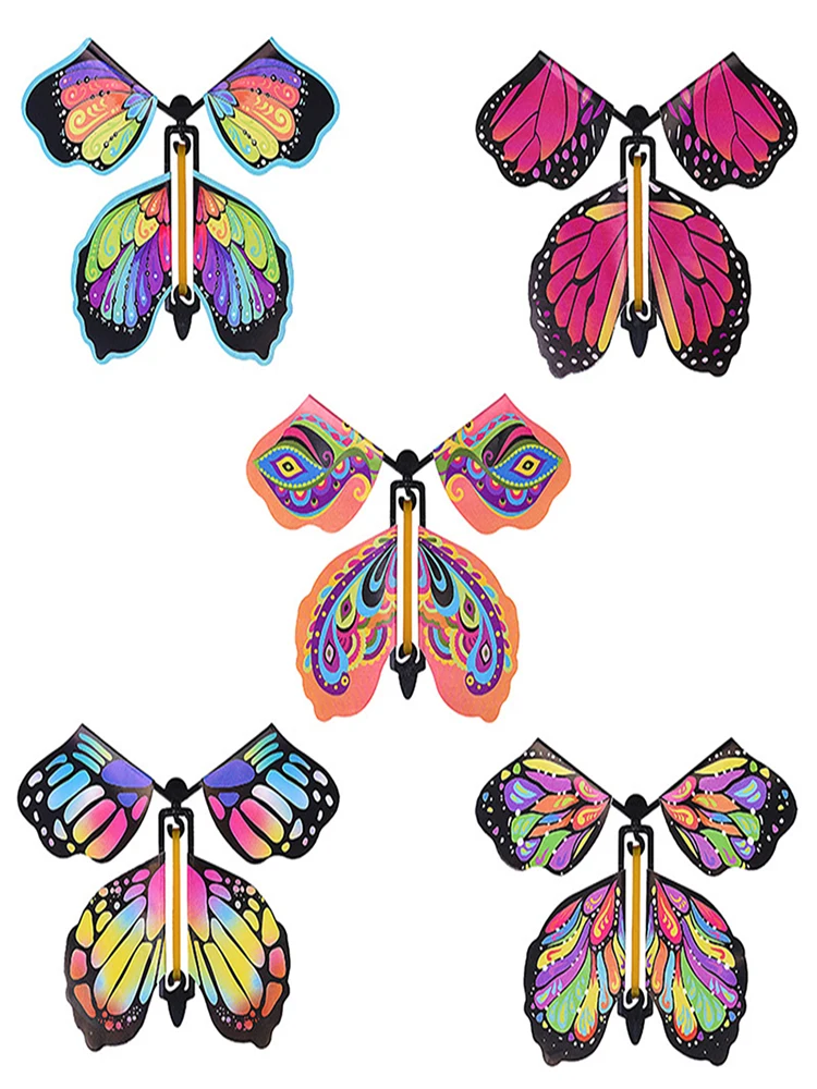 Mariposas voladoras voladoras, mariposa mágica voladora, cuerda sorpresa,  juguete mariposa voladora alimentado por banda goma, regalo divertido,  suministros fiesta, estilo aleatorio D/g : : Juguetes y Juegos