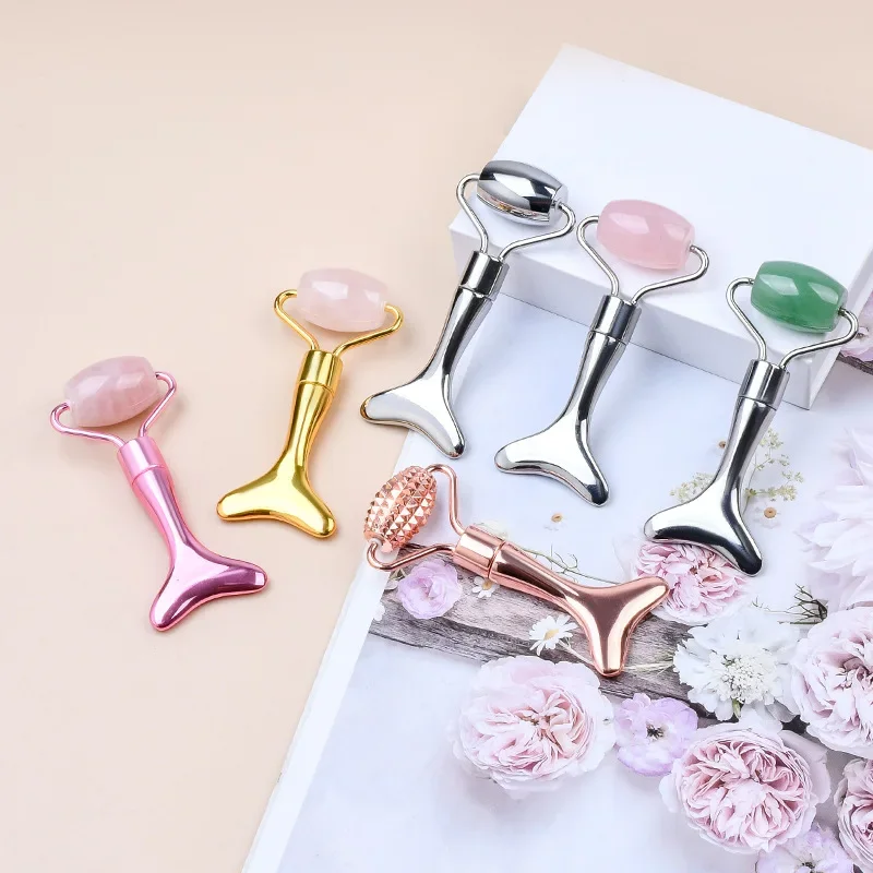 

Fish Tail Mini Scraping Board Roller 2-in-1 Natural Pink Crystal Massage Facial Beauty Stick Firms Skin Eliminates Wrinkles