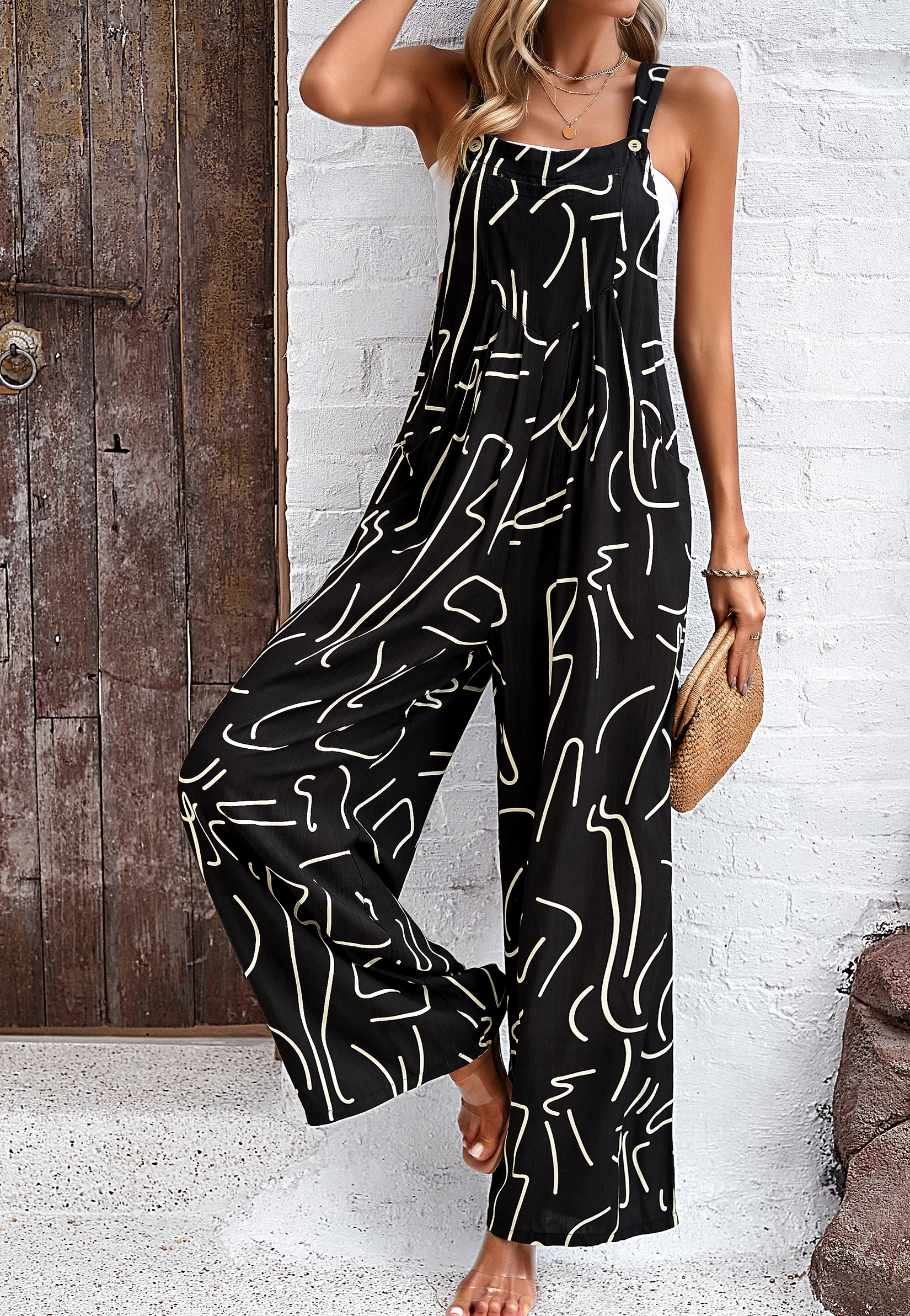 Women's printed camisole jumpsuit with elegant temperament INS style jumpsuit for spring and summer new styles jumpsuit women 2023 spring new fashionable and elegant flip collar hot diamond cross jumpsuit with belt temperament commuting