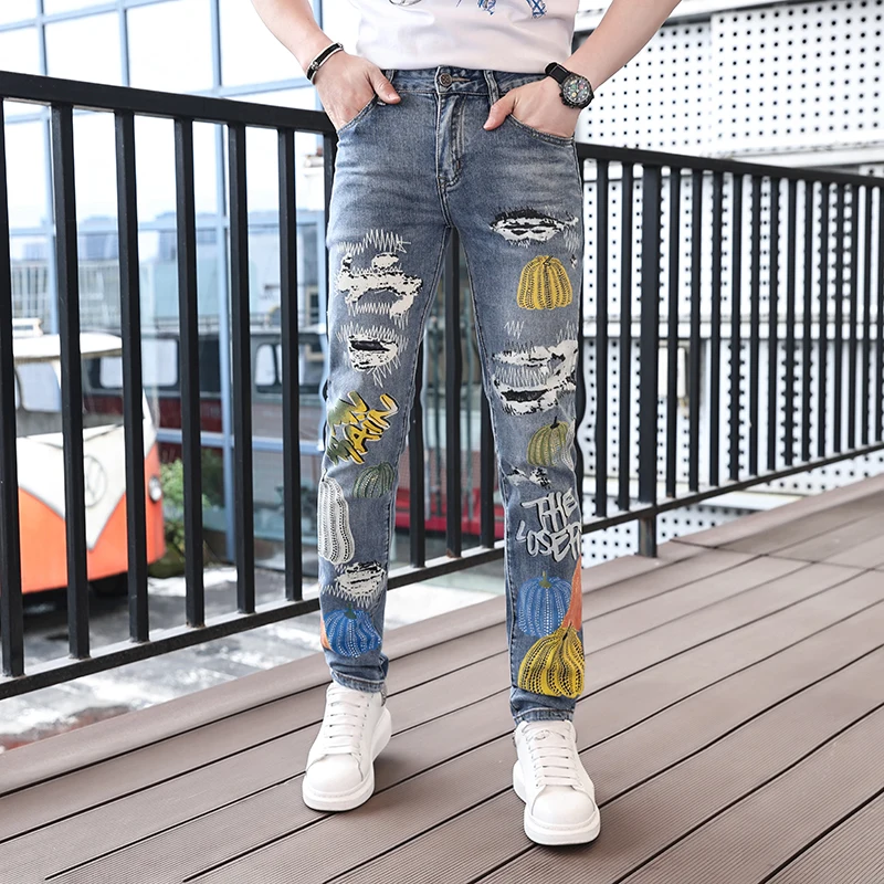 Summer thin section of light luxury street personality fashion printing hole jeans men's casual Slim long tight men's pants