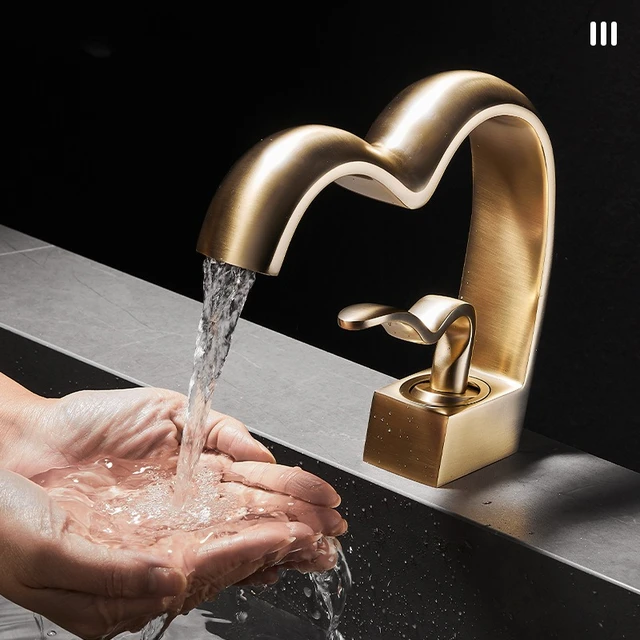 ก๊อกน้ําอ่างล้างหน้ารูปหัวใจทองเหลืองหรูหราห้องน้ําตู้ห้องน้ําใต้เคาน์เตอร์อ่างล้างหน้าก๊อกน้ําร้อนและเย็นป้องกันการกระเซ็น 1