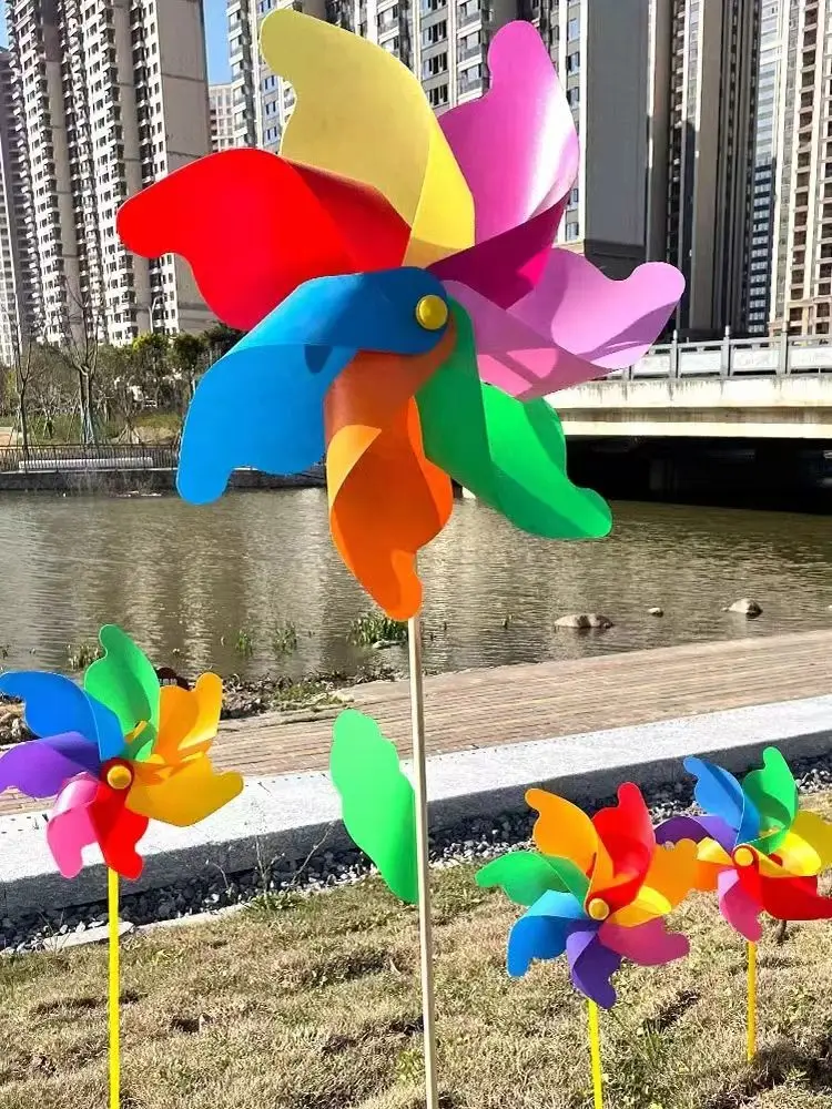 Colorful windmill outdoor decoration festival scenic park children holding rotating wooden color windmill windmill toys garden windmill