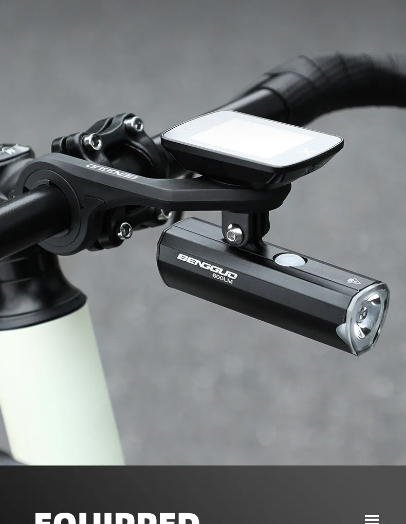 GPS computer and headlight mounted on extension bracket