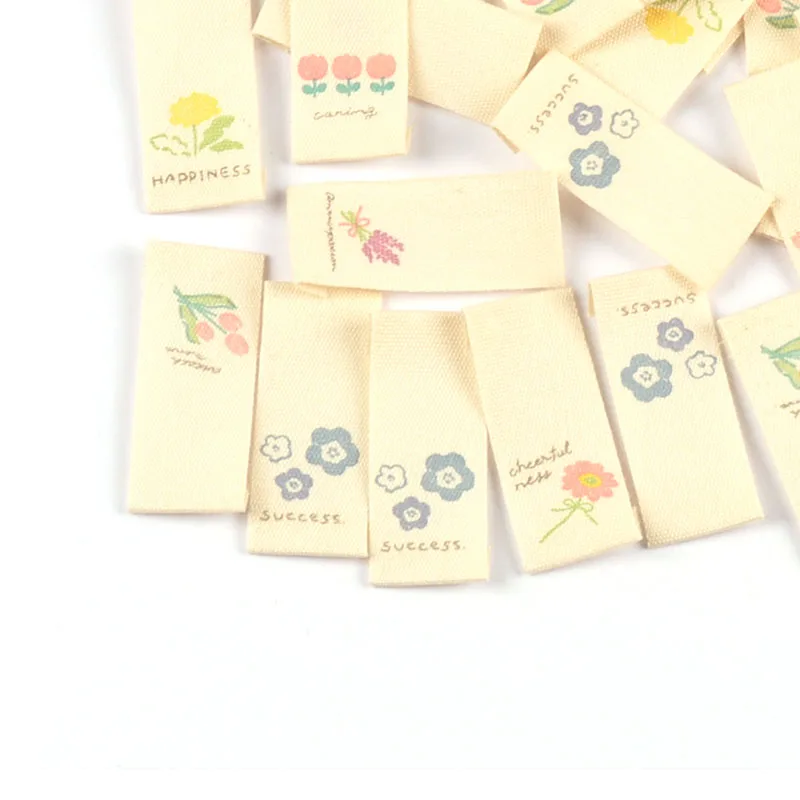 Description Picture 4 of item50pcs 16*38mm Mixed Flower Pattern Handmade Cotton Woven Label For Clothing Labels Cartoon Shoes Bags Garment Tags
