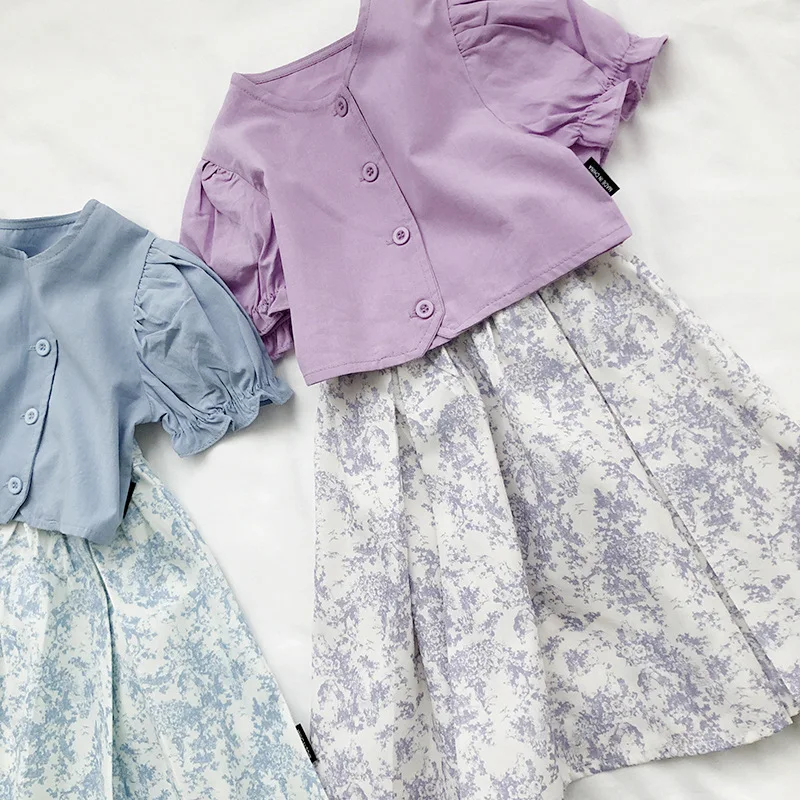 

2024 Summer Child Clothes Sets Short Sleeve Ruffles T-shirt Purple Floral Skirts 2 Piece Sets Designer Girls Clothes Sets 18M-6T
