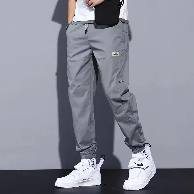 thumbnail image 1 of Pantalones cargo holgados y modernos con frunces, pantalones casuales recortados a la moda para hombres, tendencia juvenil de primavera y otoño, color sólido, 1 of 5