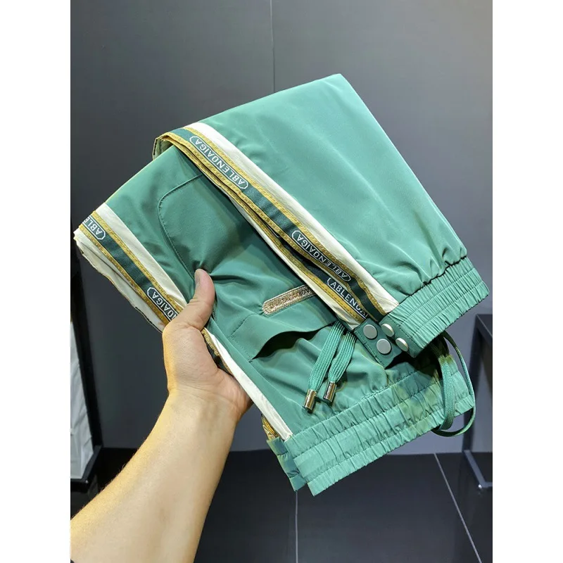 2024 Summer Ultra Thin Ice Silk Side Stripe Tie Feet Casual Pants For Men'S Fashion Brand Slim Fit Drawstring Nine Point Sports