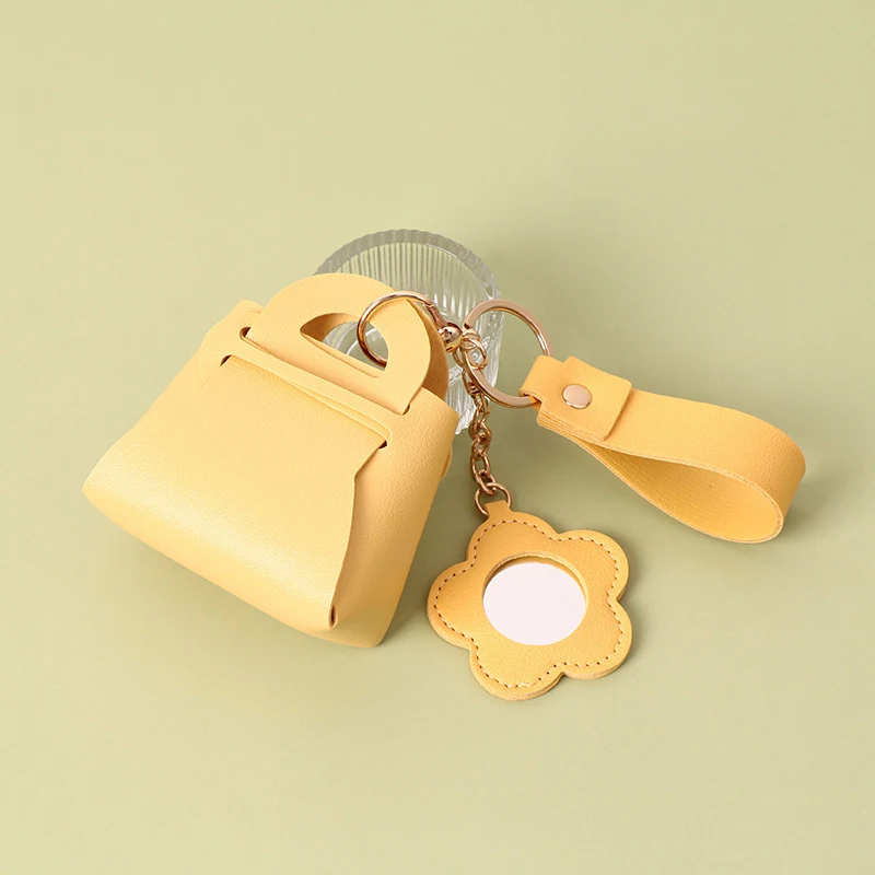 CALFOVERA Mini Backpack Keychain Coin Purse – PU Leather Twist-Lock Pouch For Coins, Earphones & Bag Charm