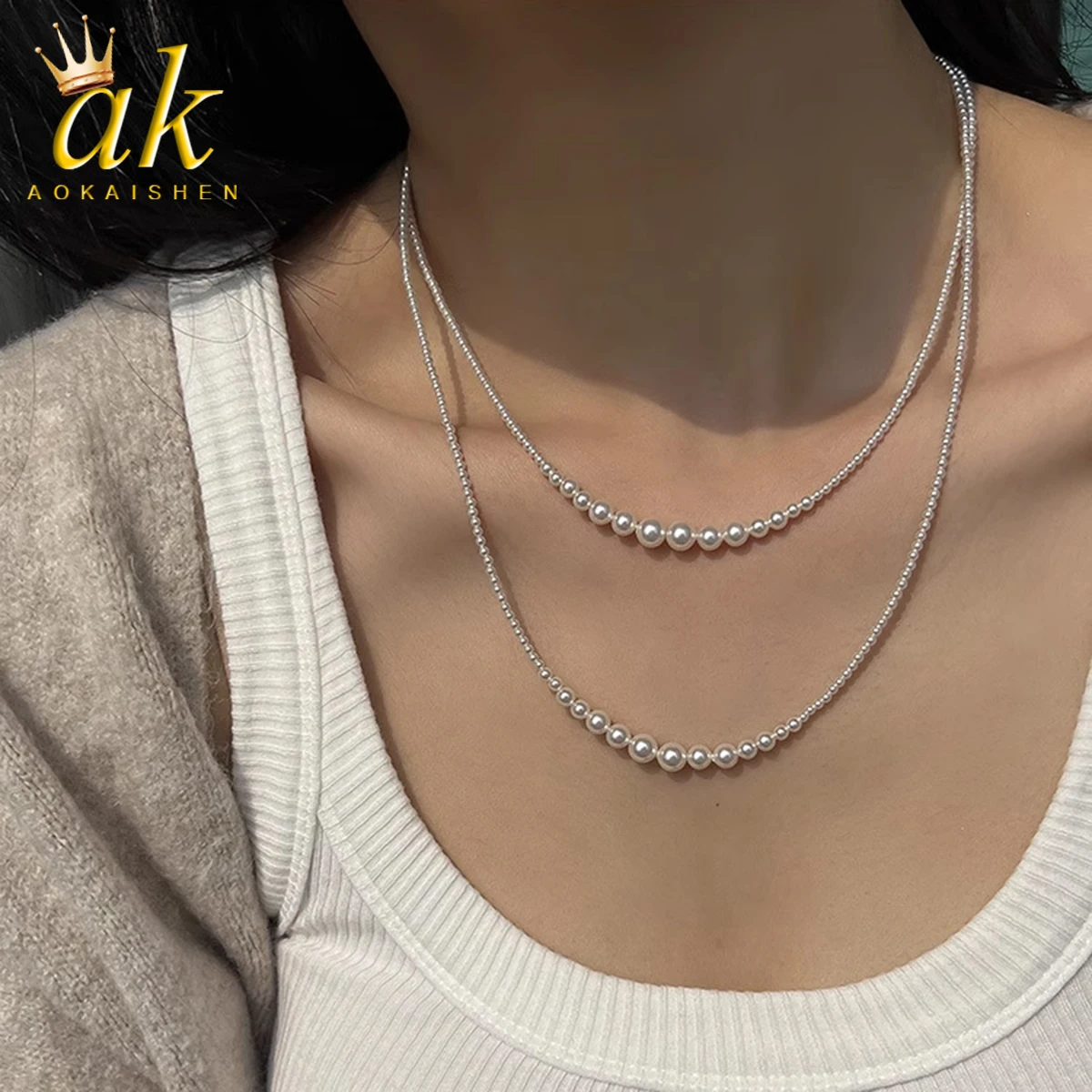 

Женское длинное ожерелье с круглым жемчугом