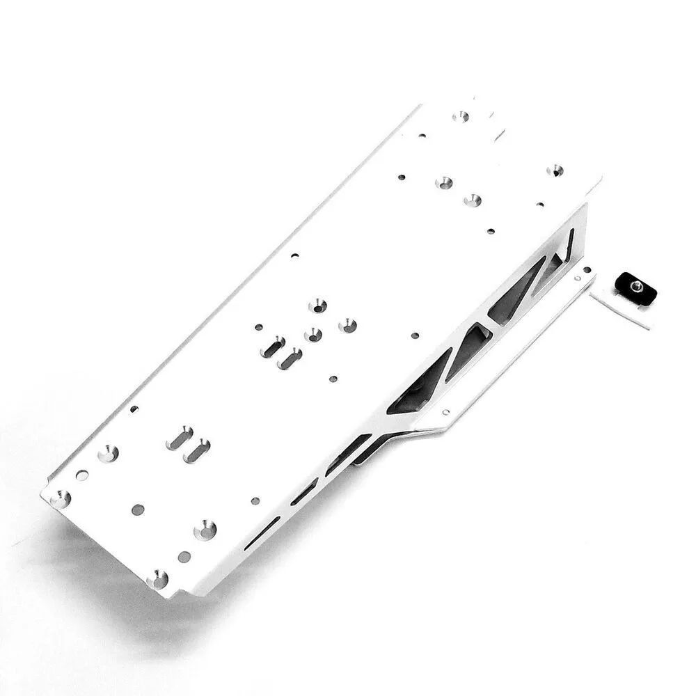 Châssis RC en aluminium monté sur un buggy Tamiya, prêt pour l'assemblage.
