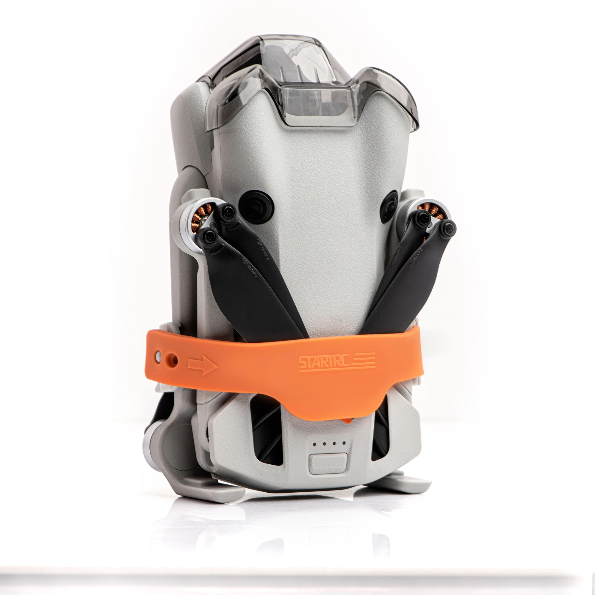 Fixateur d'hélices pour DJI Mini 4 Pro, avec vue détaillée du mécanisme de fixation et de protection.