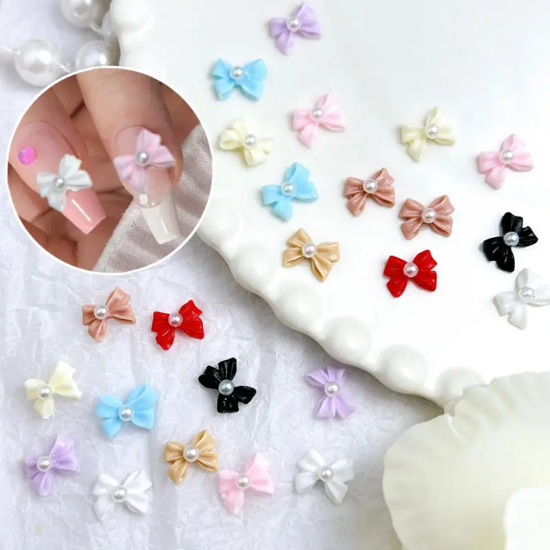 20PCS 솔리드 컬러 진주 Bowknots 네일 매력 3D 미니멀리스트 광택 넥타이 수지 네일 아트 장식 DIY 머리핀 손톱 장식품
