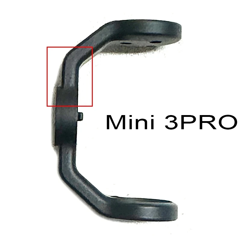 Hélices DJI Mini 3 en plastique noir, disposées sur fond blanc.