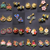 10 pièces alliage huile dégoulinant plaqué or émail pendentifs fleur sourire Lotus papillon charme bijoux à bricoler soi-même faisant collier Bracelets 1