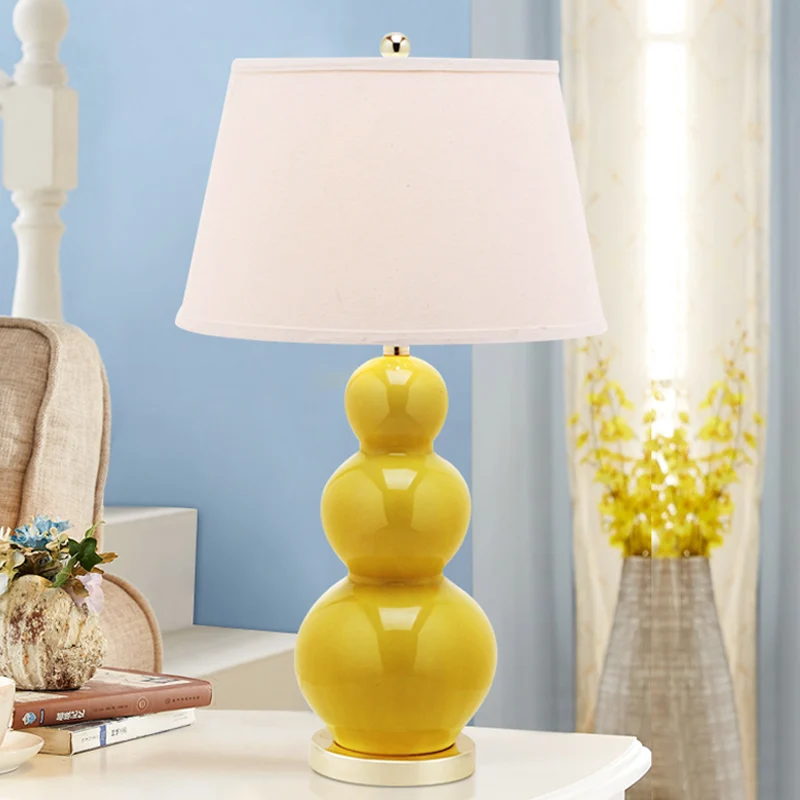 Modern ceramic desk lamp Bedroom bedside warm simple personality Tartrazine romantic warm light living room model room lamp