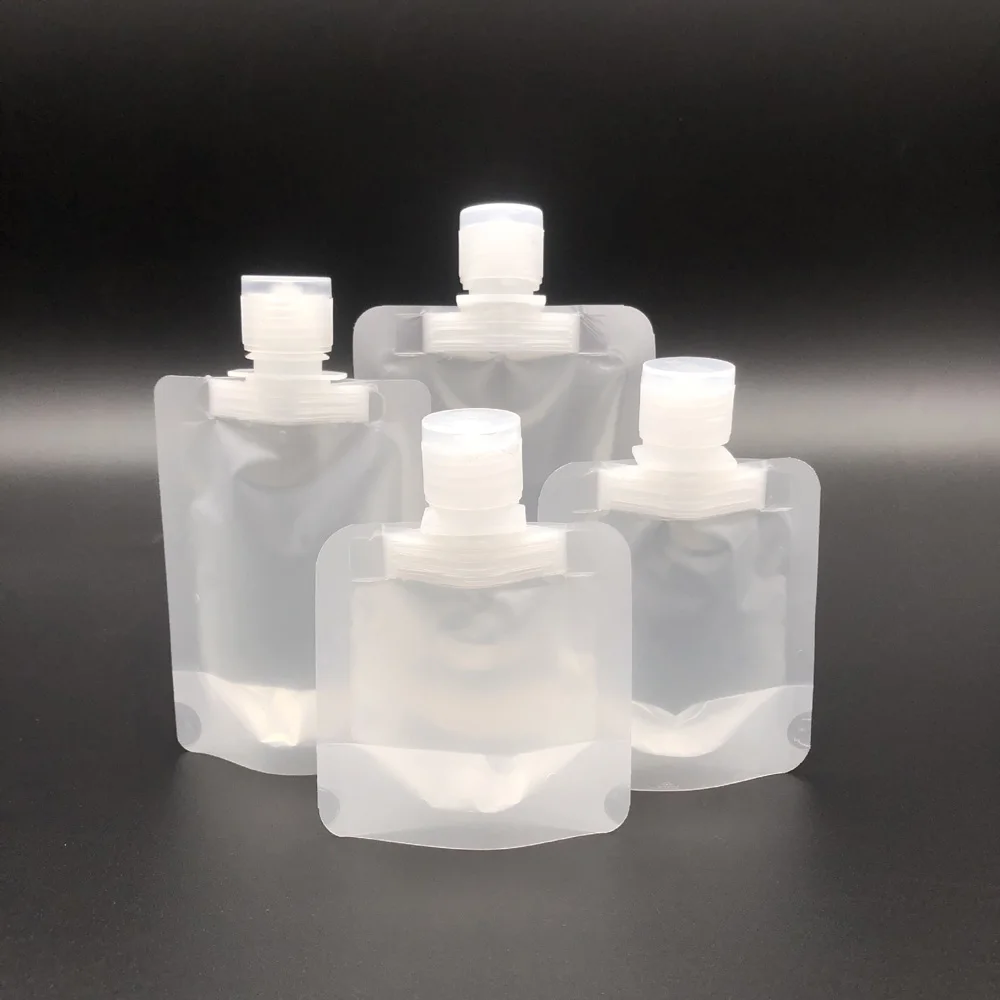 

5pcs 30ml&50ml&100ml Transparent Plastic Portable Stand Up Fluid Makeup Spout Pouch Travel Packing Bag with Flip Cap