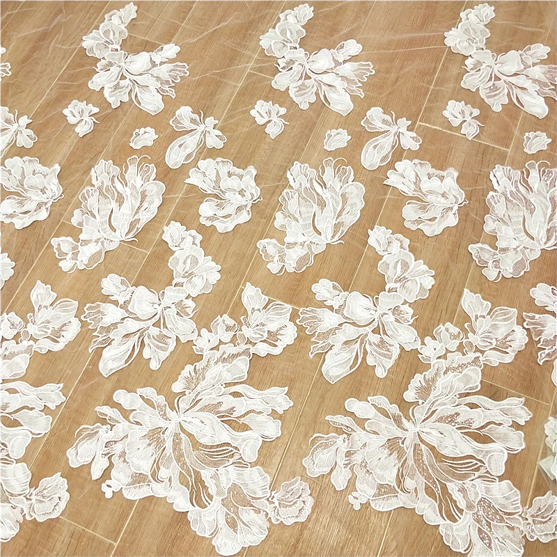 

European and American wedding dresses with the same fabric soft mesh embroidery sequins fabric hollow fashion handmade DIY