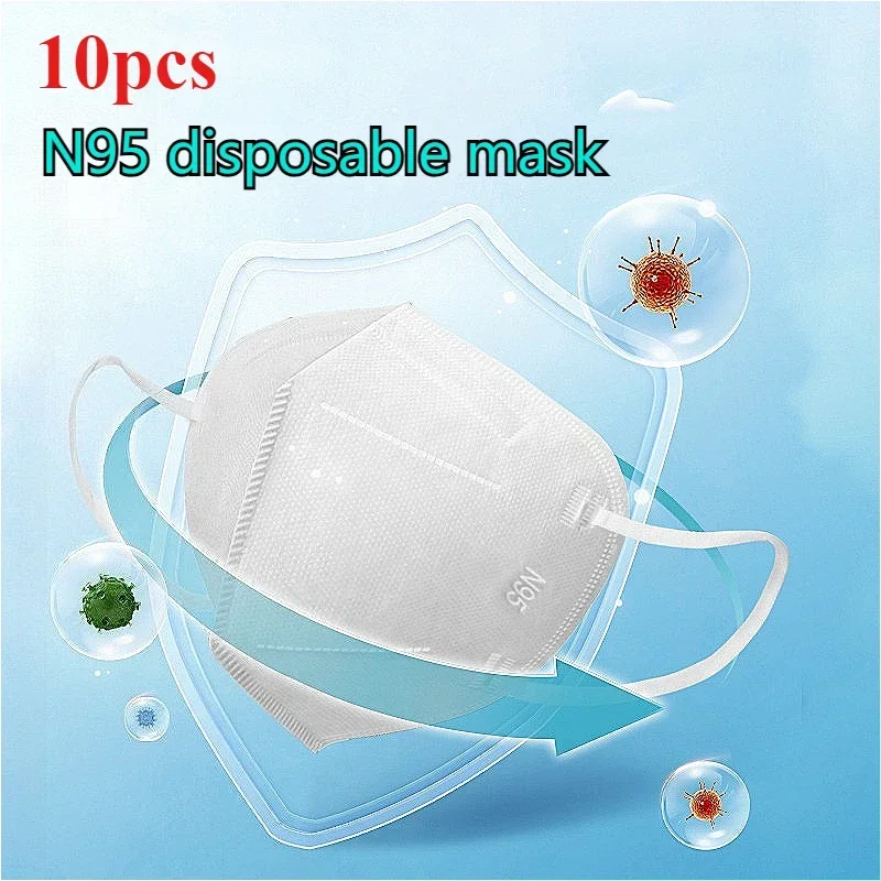 Masque N95 jetable porté par un ouvrier sur chantier, protection anti-poussière et gouttelettes.