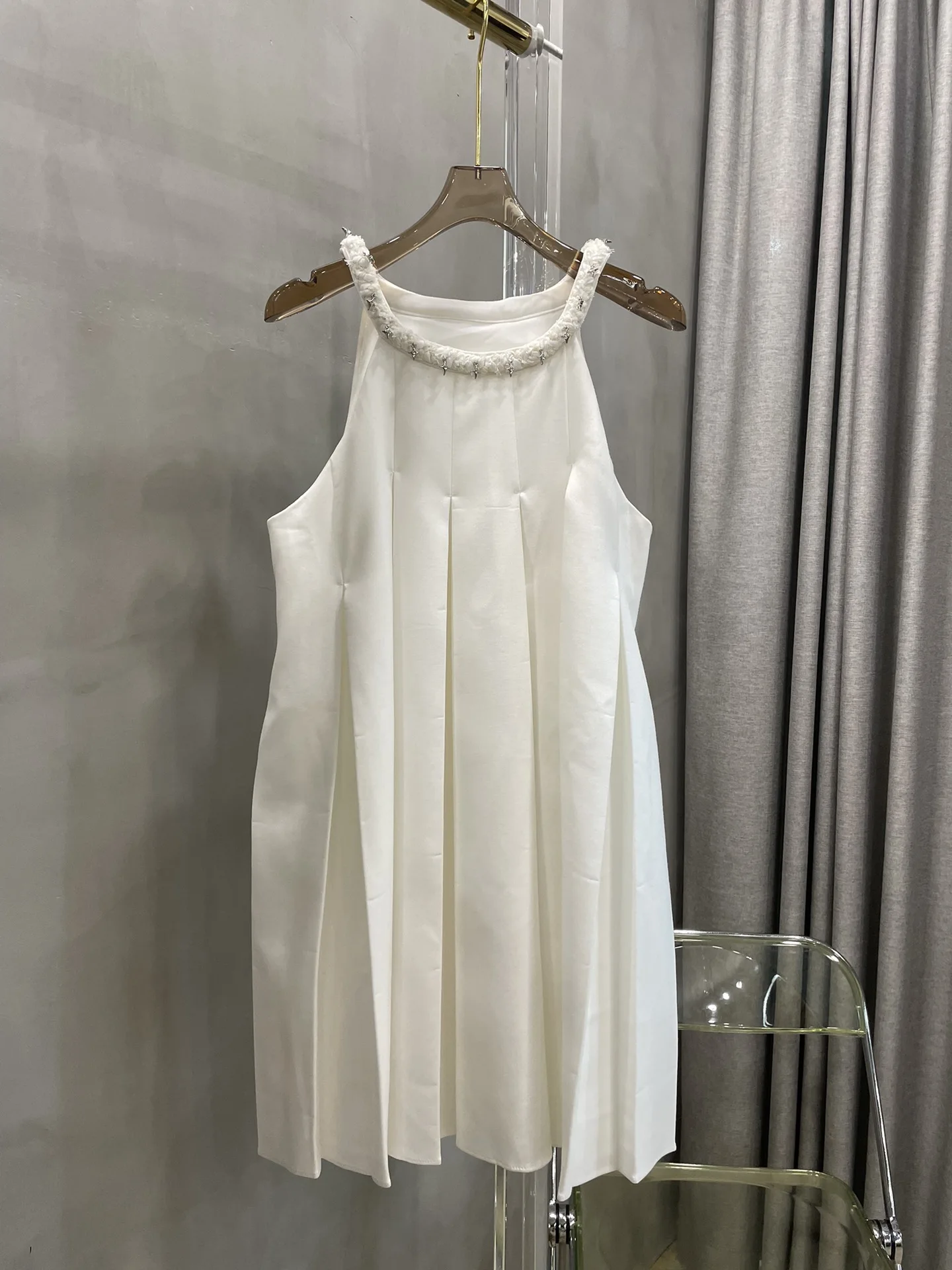 

The new pleated halter sleeveless sundress is a must-have for summer