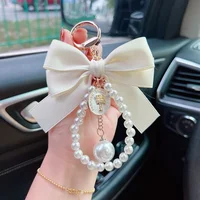 Grand nœud papillon à la mode, chaîne de perles, pendentif de voiture pour femmes, fourre-tout, ornement suspendu 3
