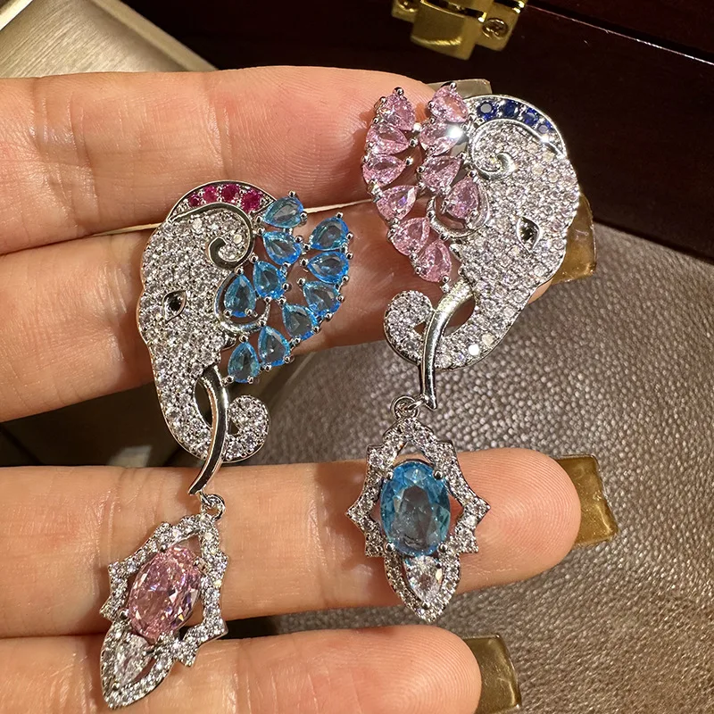 

Women Bohemian Tide Asymmetric Elephant Earrings