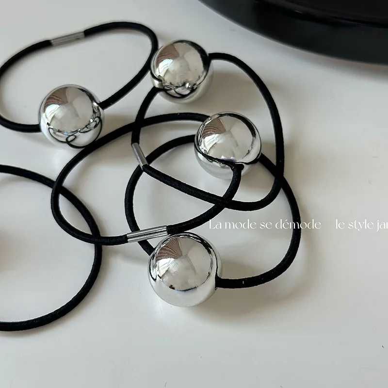 

Wholesale of Korean Style New Hair Rope Alloy Silver Ball Head Rope High Elastic Leather Band Tied Ponytail Hair Accessories