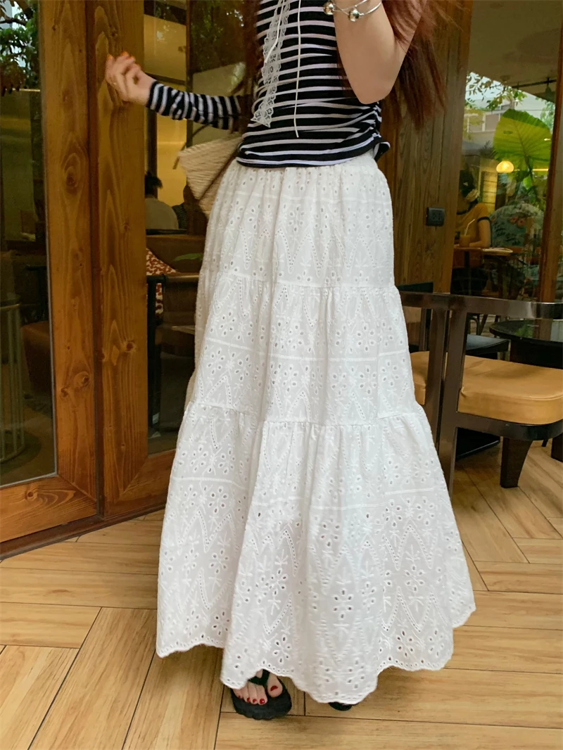 

Benuynffy Hollow out White Lace Long Skirts Women 2024 Spring Summer Elastic Waist Sweet Ladies Ruffled Swing A-line Maxi Skirt