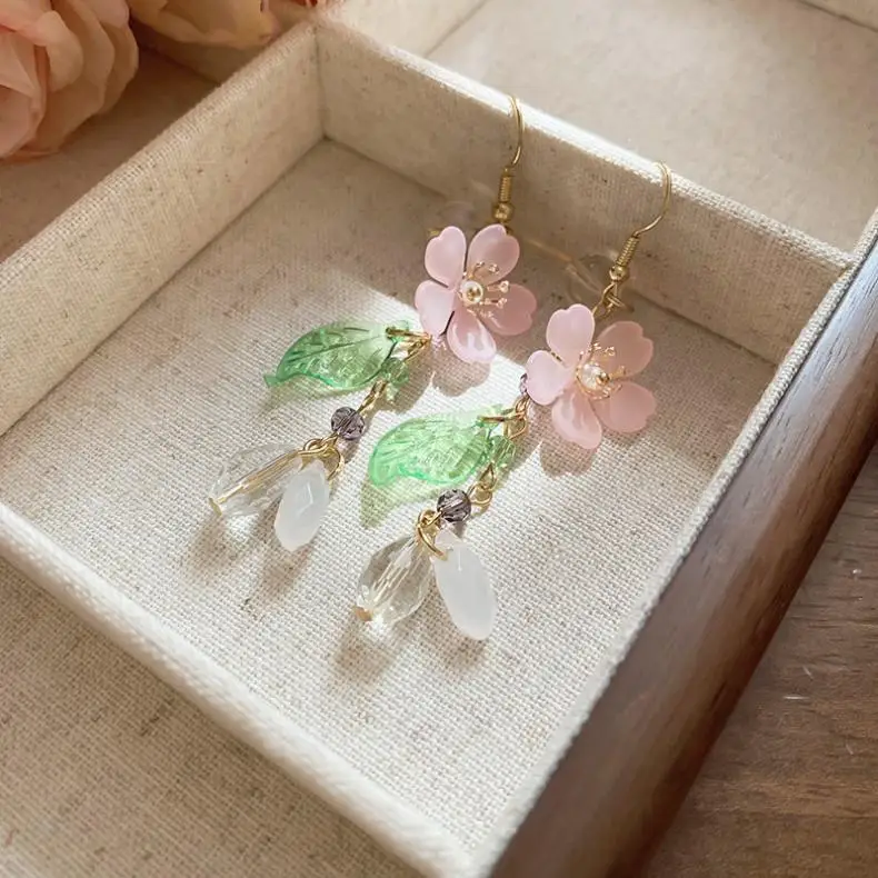 S7b2db80dfe0a4f989ed0be43b870f41eK Elegant White Orchid Flower Earring for Women Ladies Temperament Metal Leaves Long Tassel Drop Earrings Hook Jewelry Accessories Mallzona