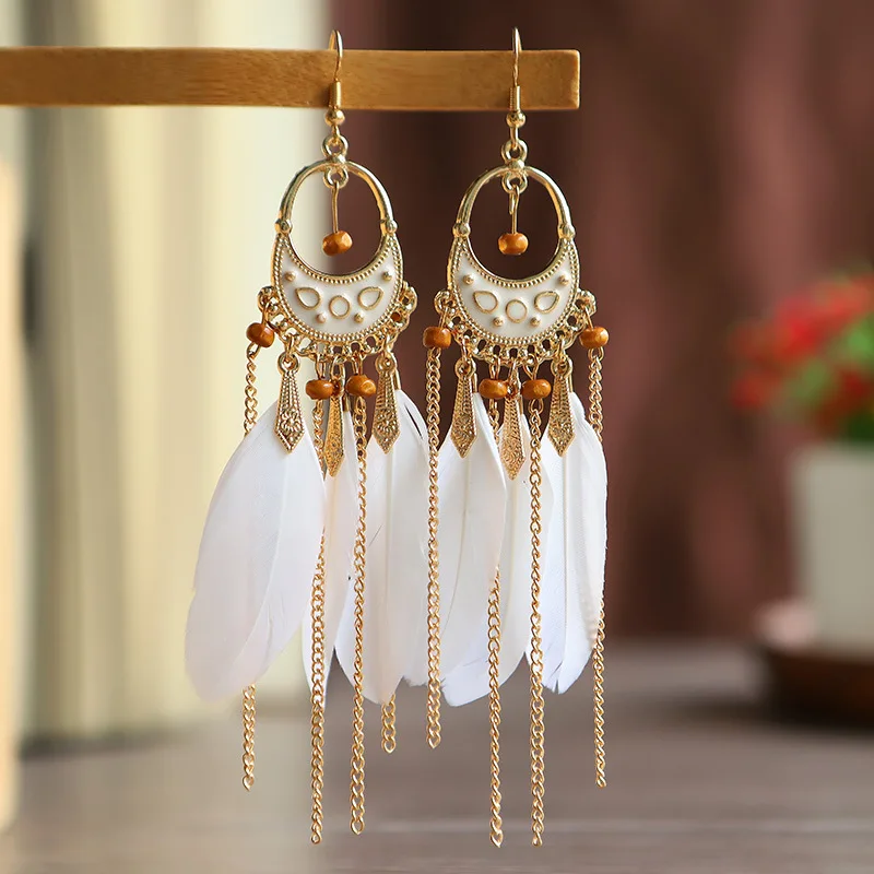

Korean white long fringed feather earrings women's bohemian personality bead stud earrings wholesale long earrings for women 18k