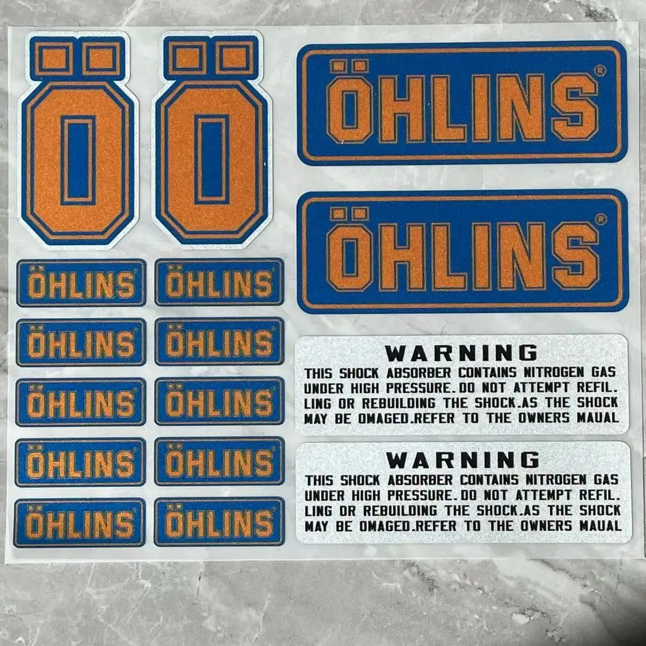 OHLINS   ݻ  ƼĿ,   ʸ  Ʈ 