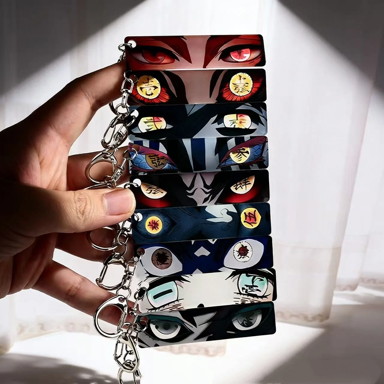 Neuer Demon Slayer Schlüsselanhänger aus Acryl, Rengoku Kyoujurou, leuchtende Augen, rechteckiges, doppelseitiges Muster, Rucksackkette, Weihnachtsgeschenk