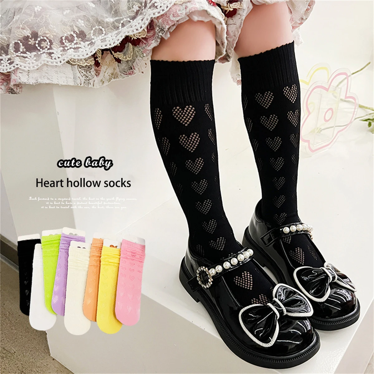 A pair of girls' dopamine heart hollow large mesh straight socks, lightweight and breathable heart mesh socks, women's long tube