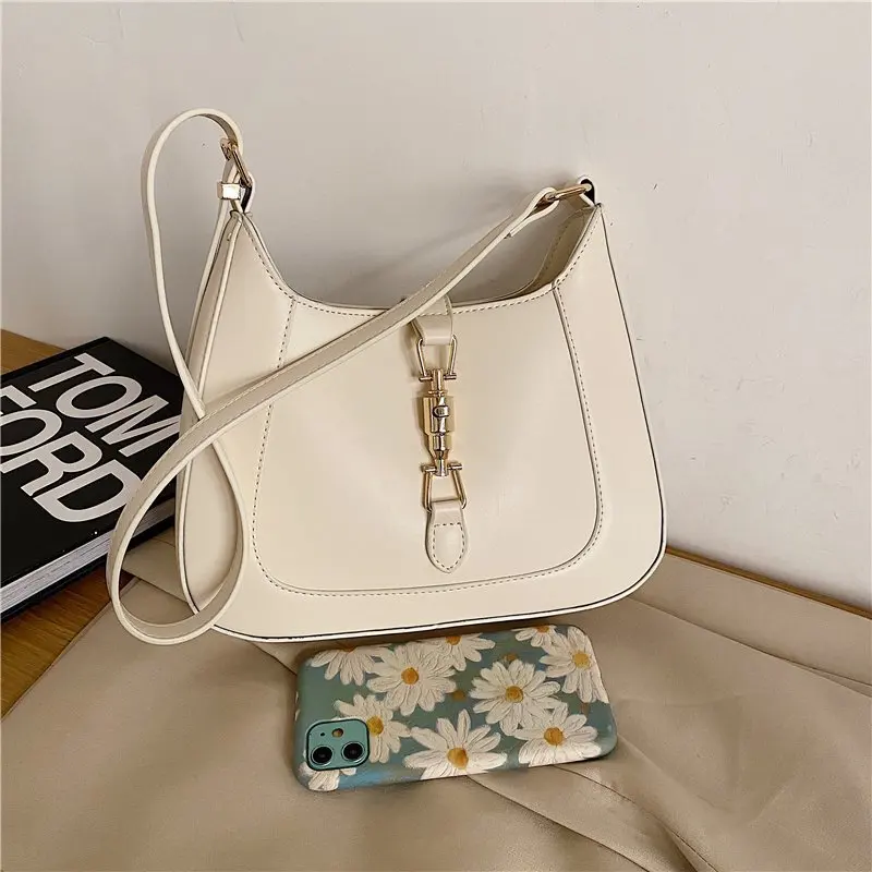 

2023 New Trendy Fashion Hasp Lock Jackie Underarm Hobo Textured Portable Handba French Creative Designer Bag Women