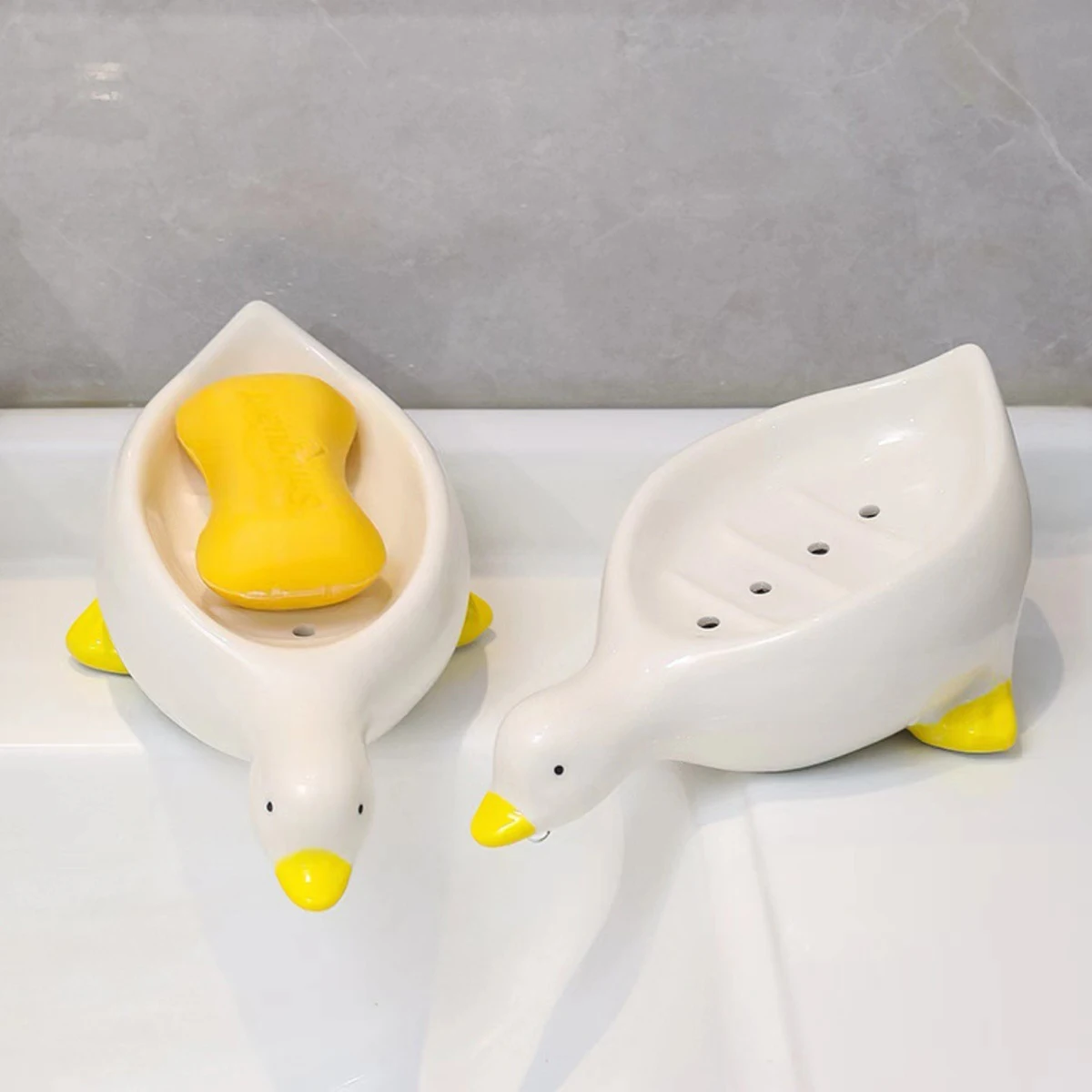 https://ae01.alicdn.com/kf/S7b68b80592e74dcb80cad94b4a941234s/Cute-Duck-Shape-Soap-Dish-Self-Draining-Soap-Holder-Soap-Rack-for-Shower-Bathroom-Home-Tub.jpg