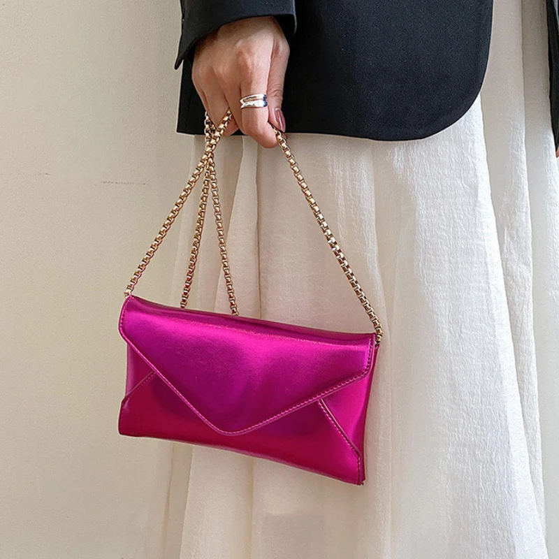 the pink clutch : The New Speedy