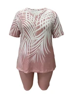Plus size women's fashion casual vacation short sleeve set with printed top and solid color bottom. - Image 2