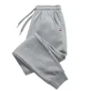 Hot selling men's and women's sports pants, outdoor jogging pants, fashionable and casual sports pants