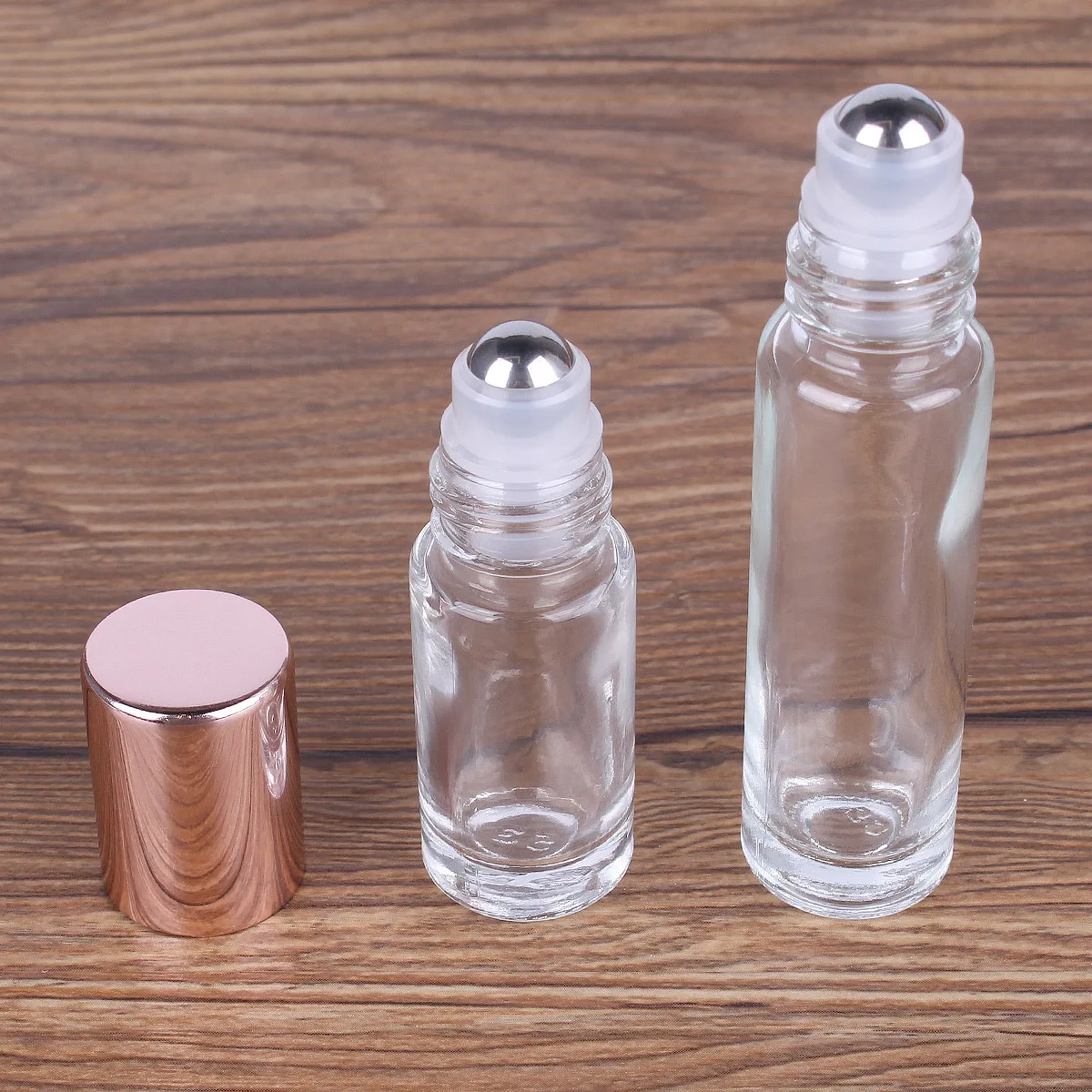 

2pcs/set(5ml+10ml) Transparent Glass Roll on Refillable Bottles with Rose-Gold Lids for Perfume Essential Oil Aromatherapy Vial